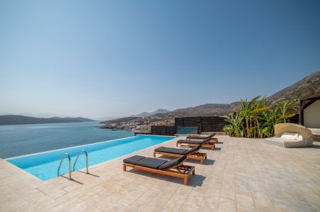  gazebo sunbeds and pool