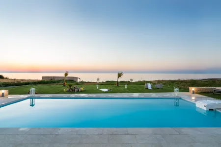 pool with sunset views