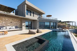 Kyra Villa is a trendy new Greek villa in Chania, Crete, elegantly designed and equipped with modern amenities for a luxury vacation.